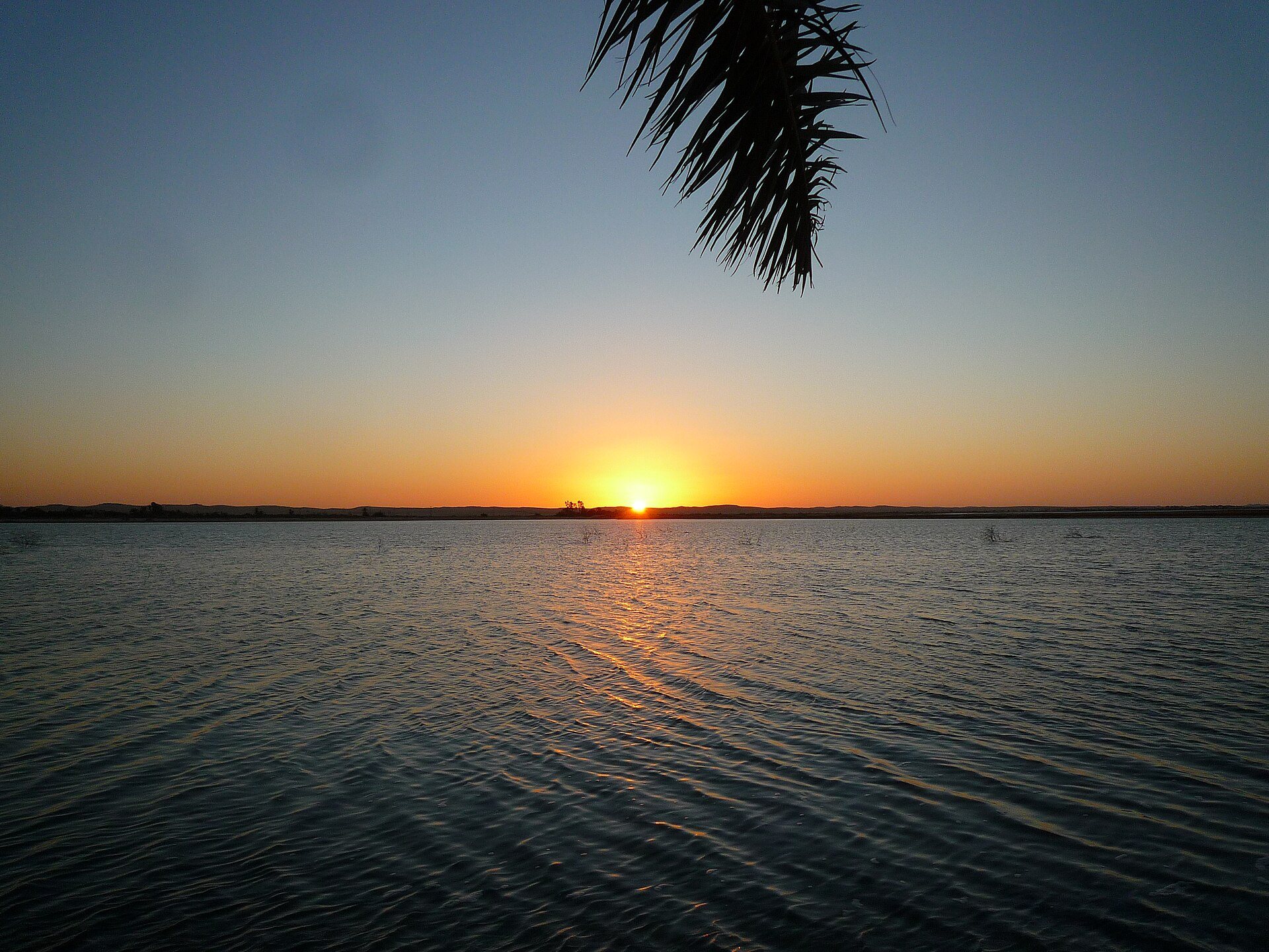 Sunset over the lake at Fatnas Island, Siwa