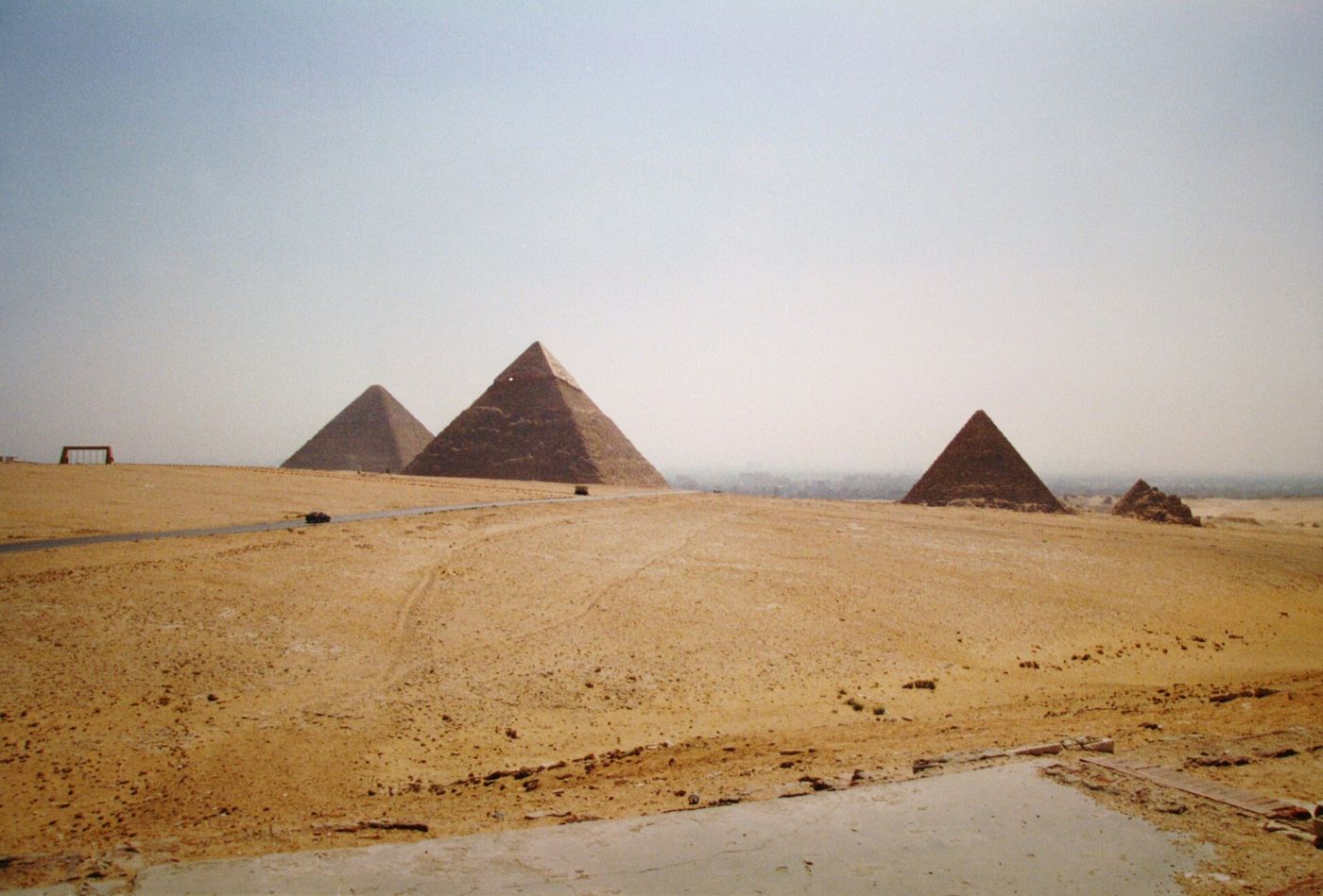The pyramids of Giza across the desert