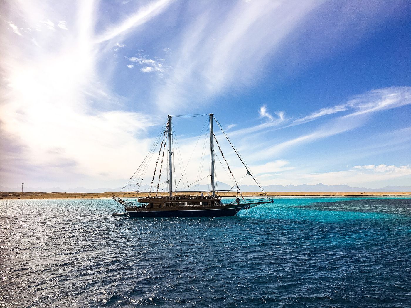 A sailing boat on the turquoise Red Sea