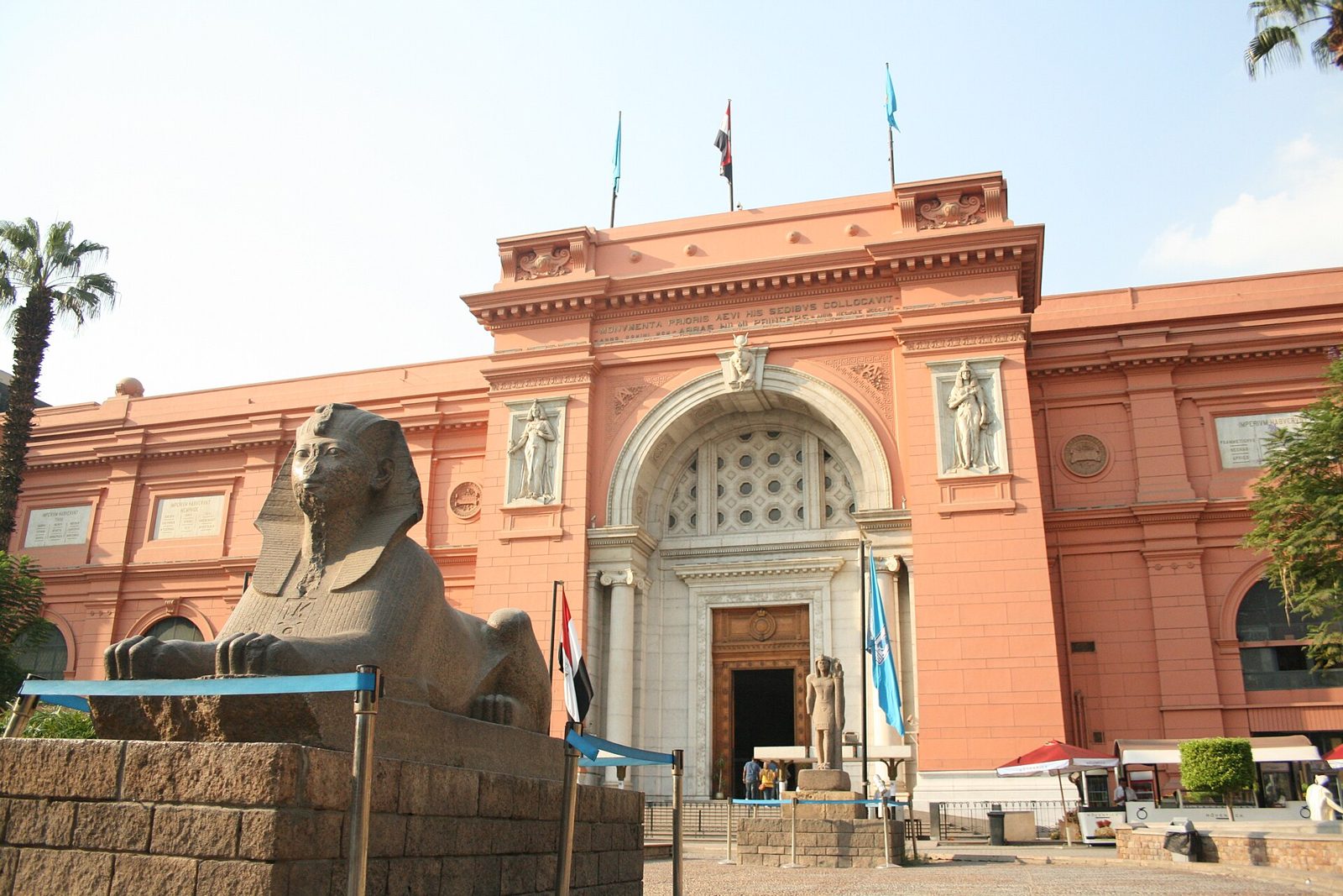 The Egyptian Museum on Tahrir Square, Cairo, with a sphinx in its front garden