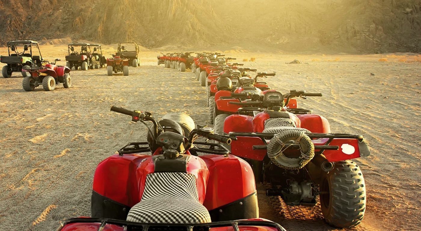 Quad bikes lined up in the Sinai desert